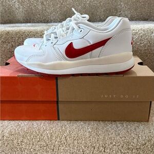 Nike Women’s White Sneakers with Red Swoosh